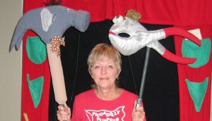 Photo of Carol Daniel with the Hammer and Pliers puppets from "Imagination Station"