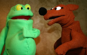 Kangaroo tries to persuade Tiddalick the Frog to share water.