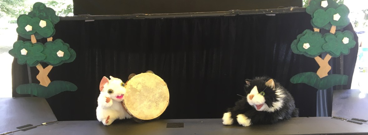 Mouse puppet with a Tamborine and cat puppet from Cat and Mouse Tales
