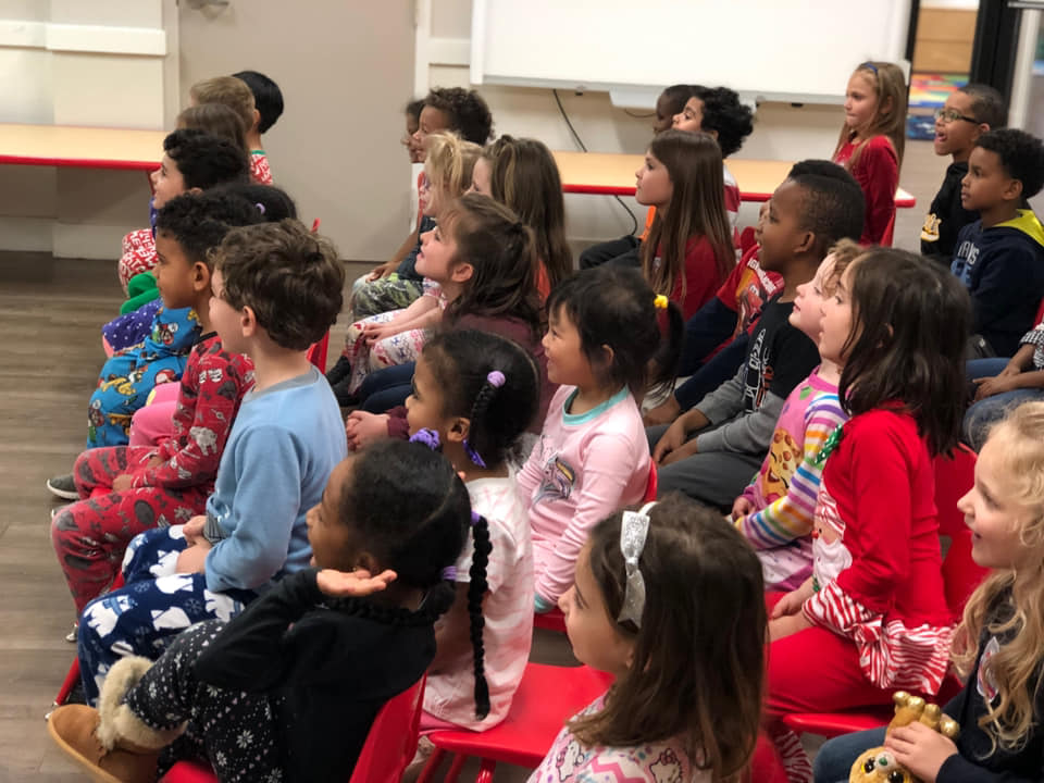 Preschool children attentively watching Cat and Mouse Tales