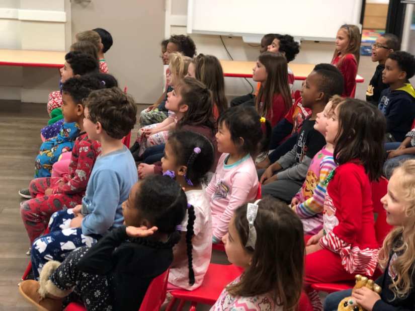Preschool children attentively watching Cat and Mouse Tales
