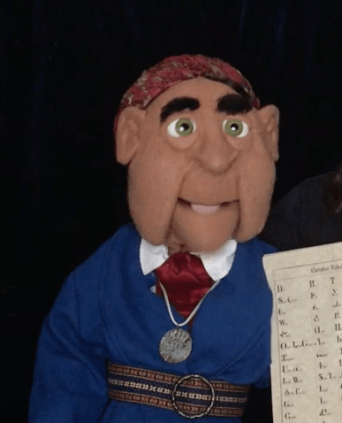 Sequoyah holding the Cherokee syllabary